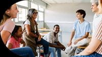 University faculty collaborating in a learning space.