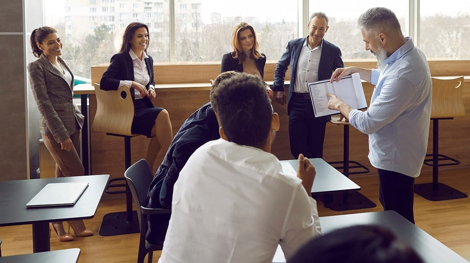 A certified instructor leading an organization's team training session.