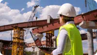construction-worker-in-hard-hat-at-construction-site