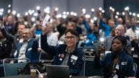 people-in-crowd-shining-phone-flashlights