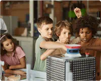 children working on experiment