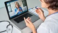 Laptop showing a virtual health visit