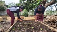 Creating-Resilient-Communities-women-bent-down-working-garden