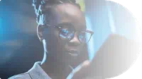 woman-in-glasses-looking-at-tablet