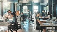 Focused project professionals working in a fast-paced PMO (Project Management Office).