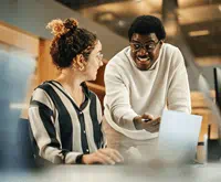 Instructor guiding a student