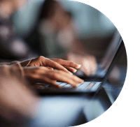 hands typing on a keyboard