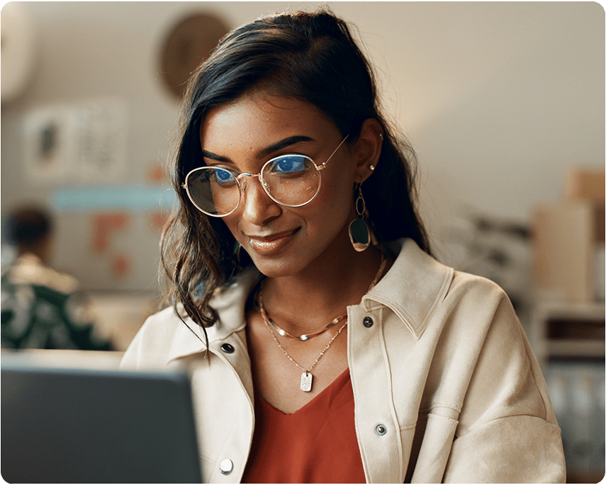 Woman looking at laptop screen