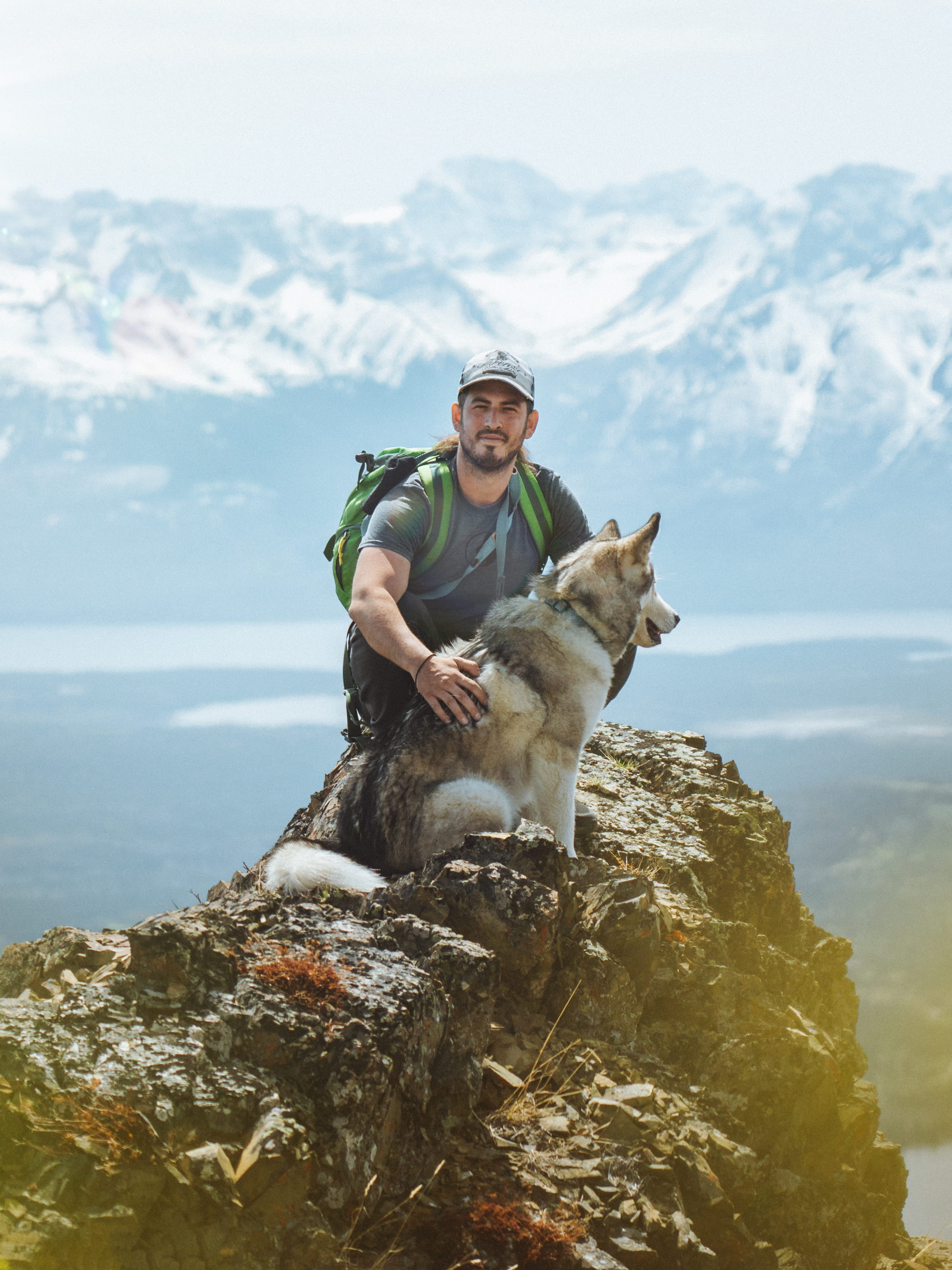 michael-on-mountain-posing-with-dog
