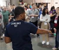 man-looking-into-crowd