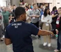 man-looking-into-crowd