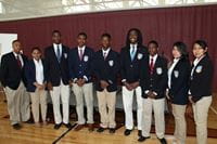 YMWIC-students-standing-hands-in-front