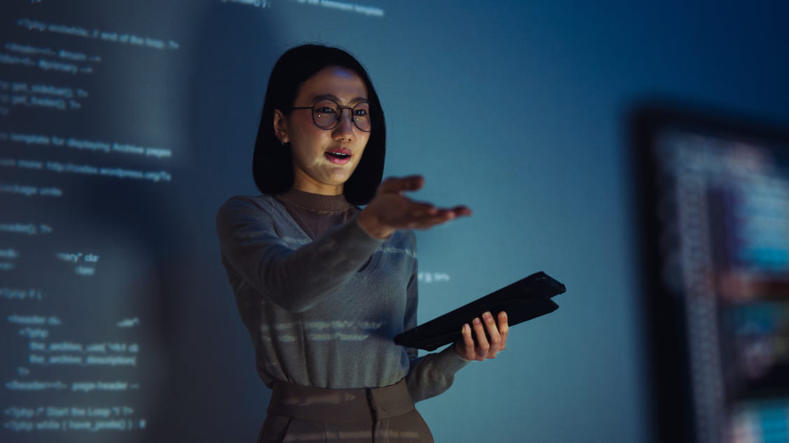 woman-looking-at-tech