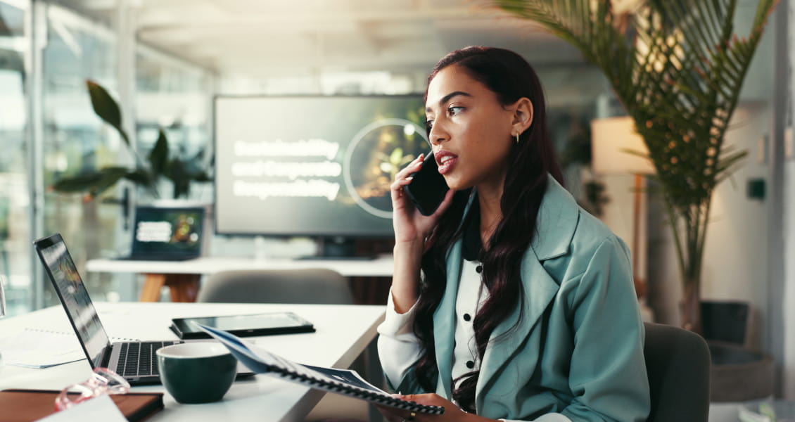 woman-on-phone-at-desk