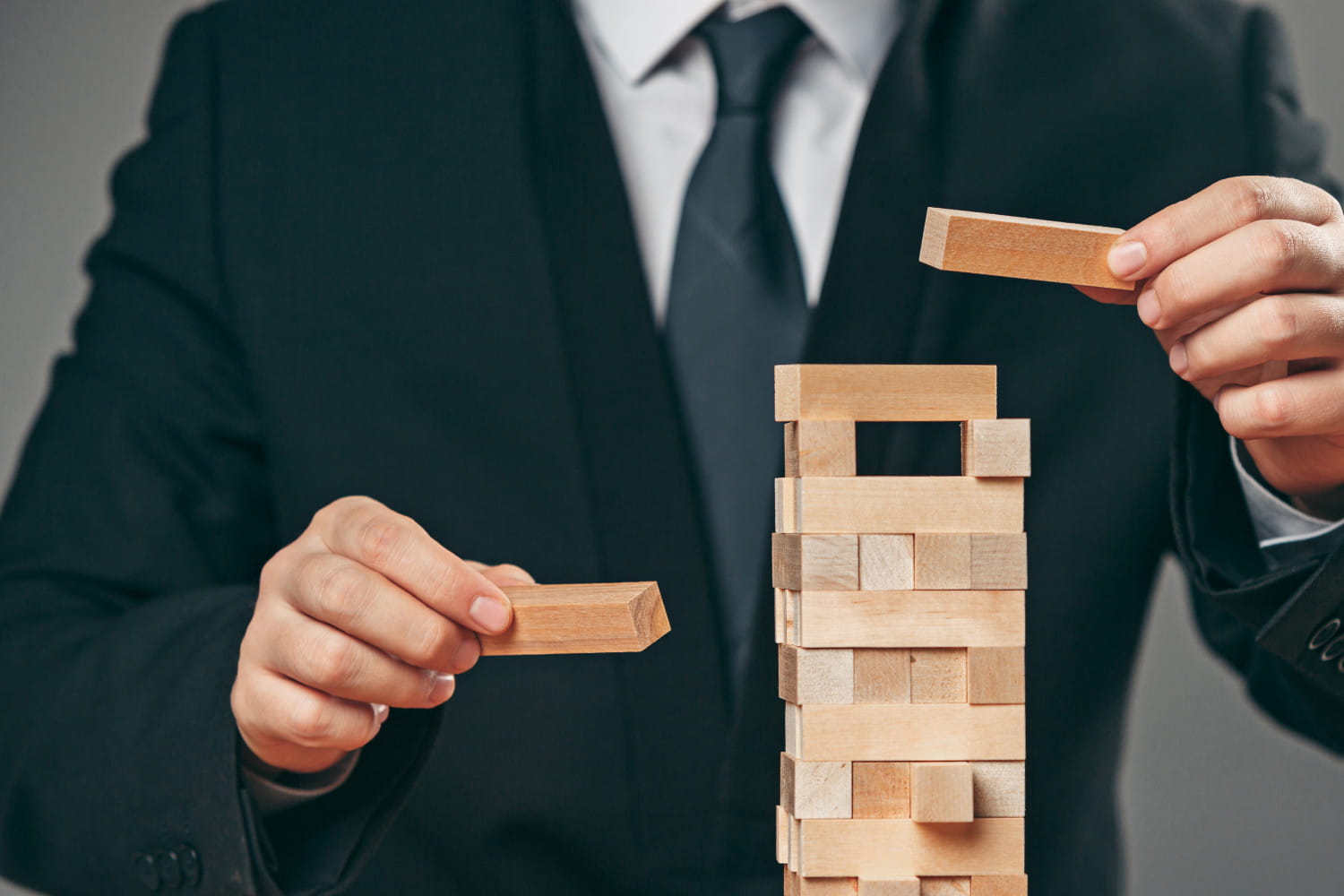 Man Wooden Cubes Table Management Concept