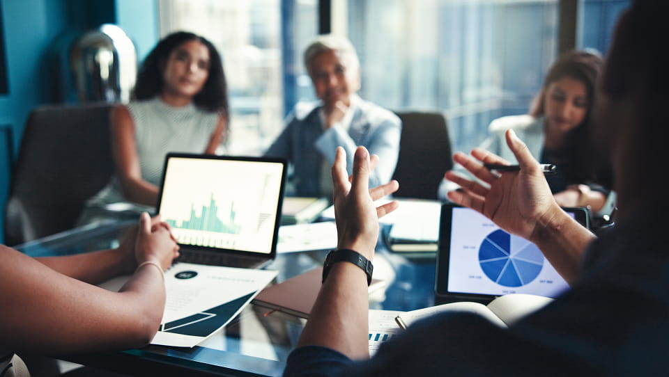 Certified project professionals in a collaborative meeting