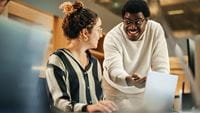 Trainer guiding a learner