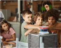 children working on experiment 