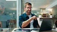 man-sitting-at-computer-pondering