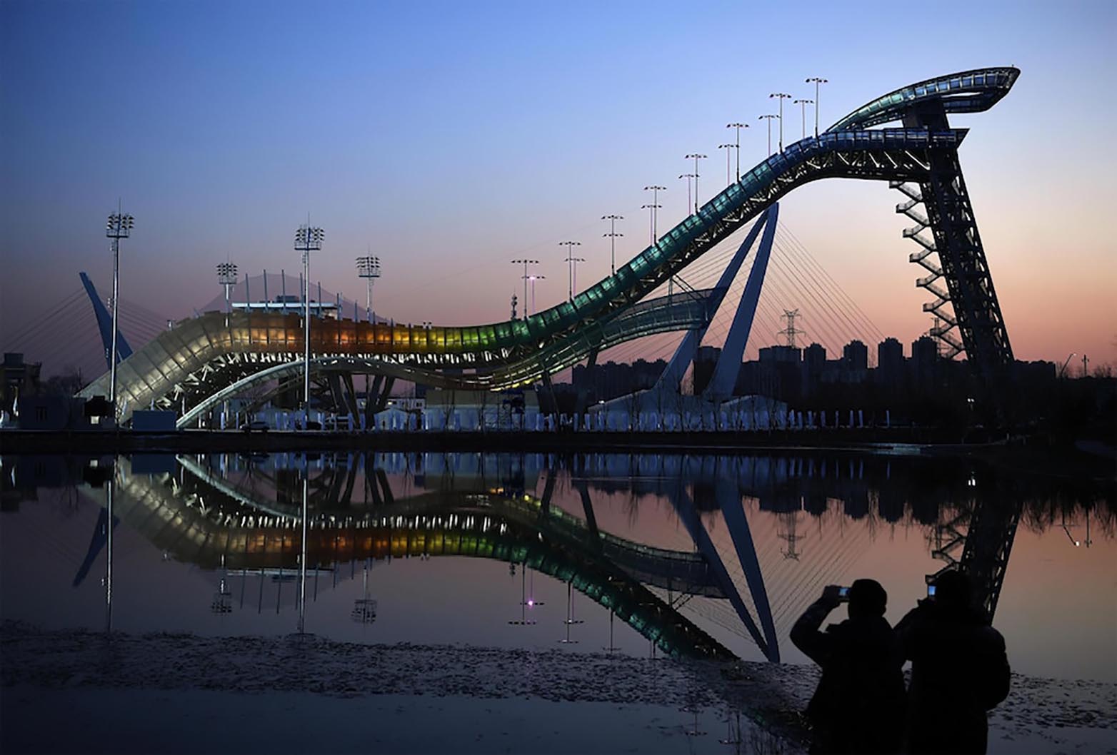 Snowboarders will fly down ramps set off the side of the site's 70-meter cooling towers.