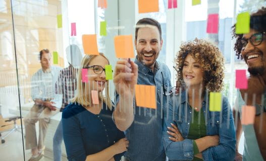 team-collaborating-with-sticky-notes2