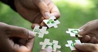 hands-holding-puzzle-pieces