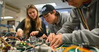 youth-working-together-on-technology