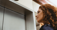 woman-looking-at-elevator